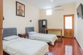 Отель Mahendra Beach Inn  Kuta